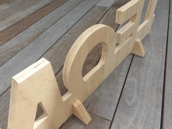 Back view of plywood letter set